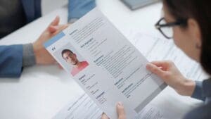 Resume work experience section with bullet points and job history entries on a white page